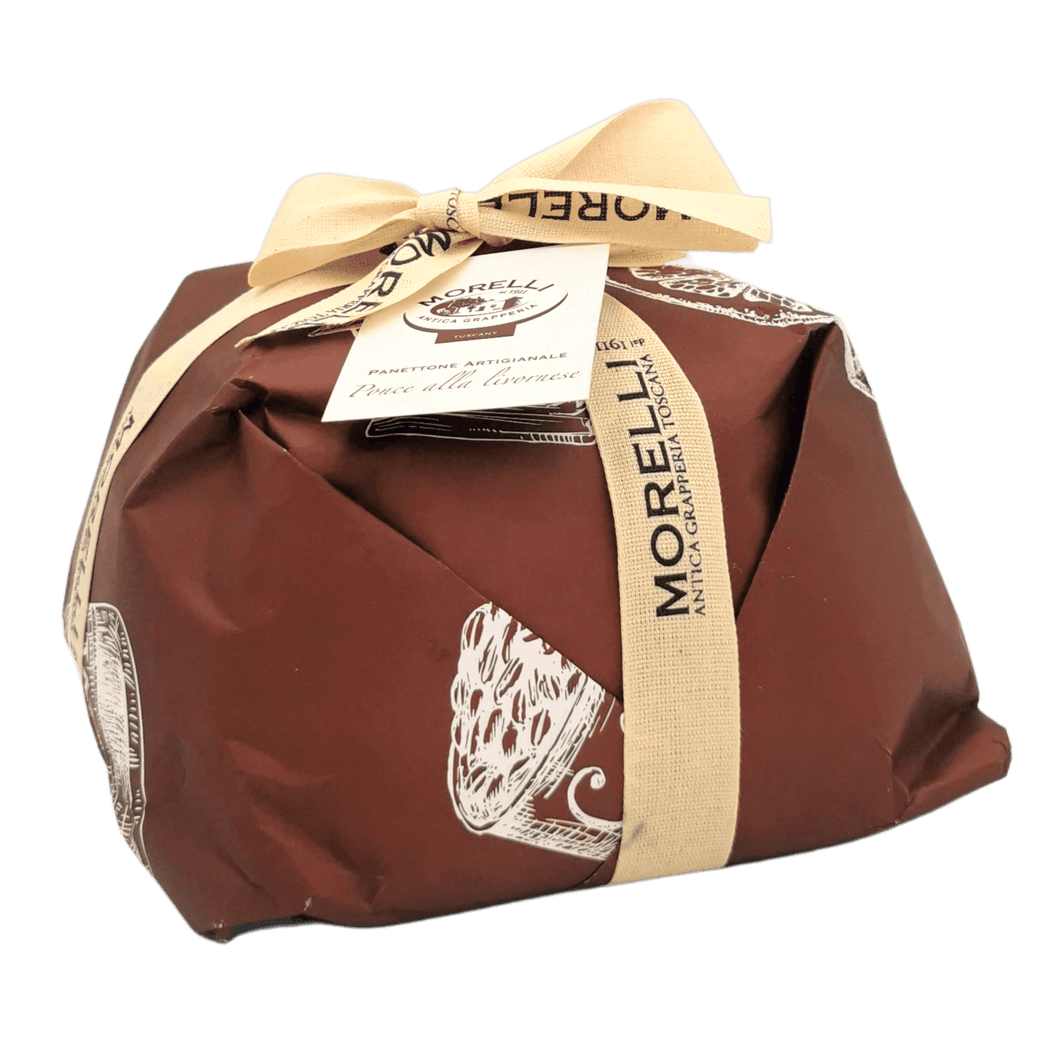 Panettone au chocolat noir Punch Livournais 750 g, emballé dans un papier brun avec ruban et étiquette « Tradition Toscane » visible.